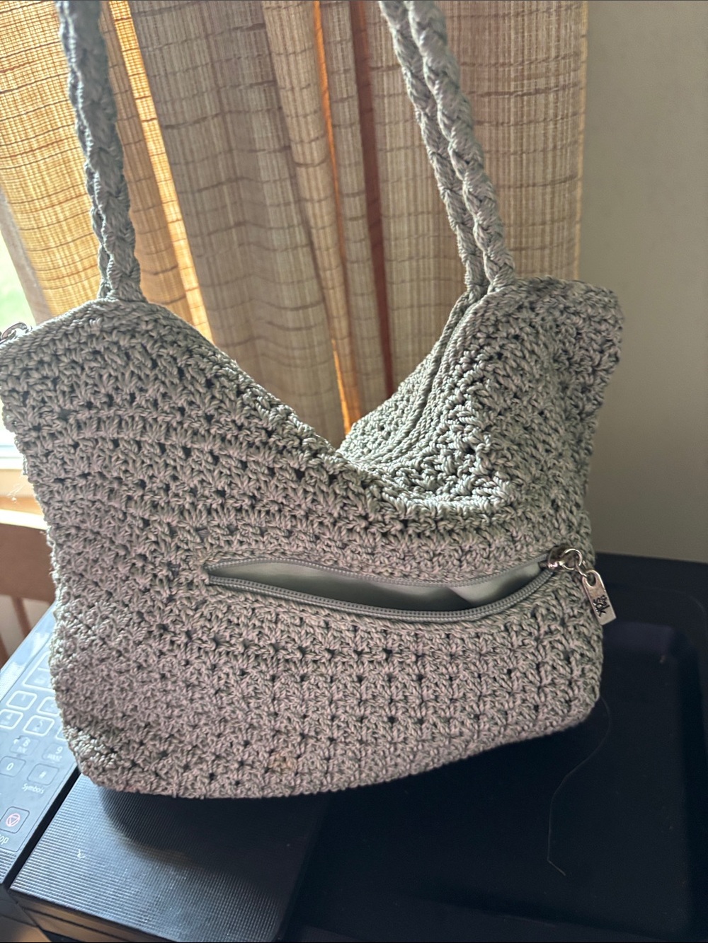 The Sak green crochet purse